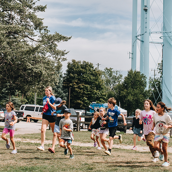 Campers running and playing